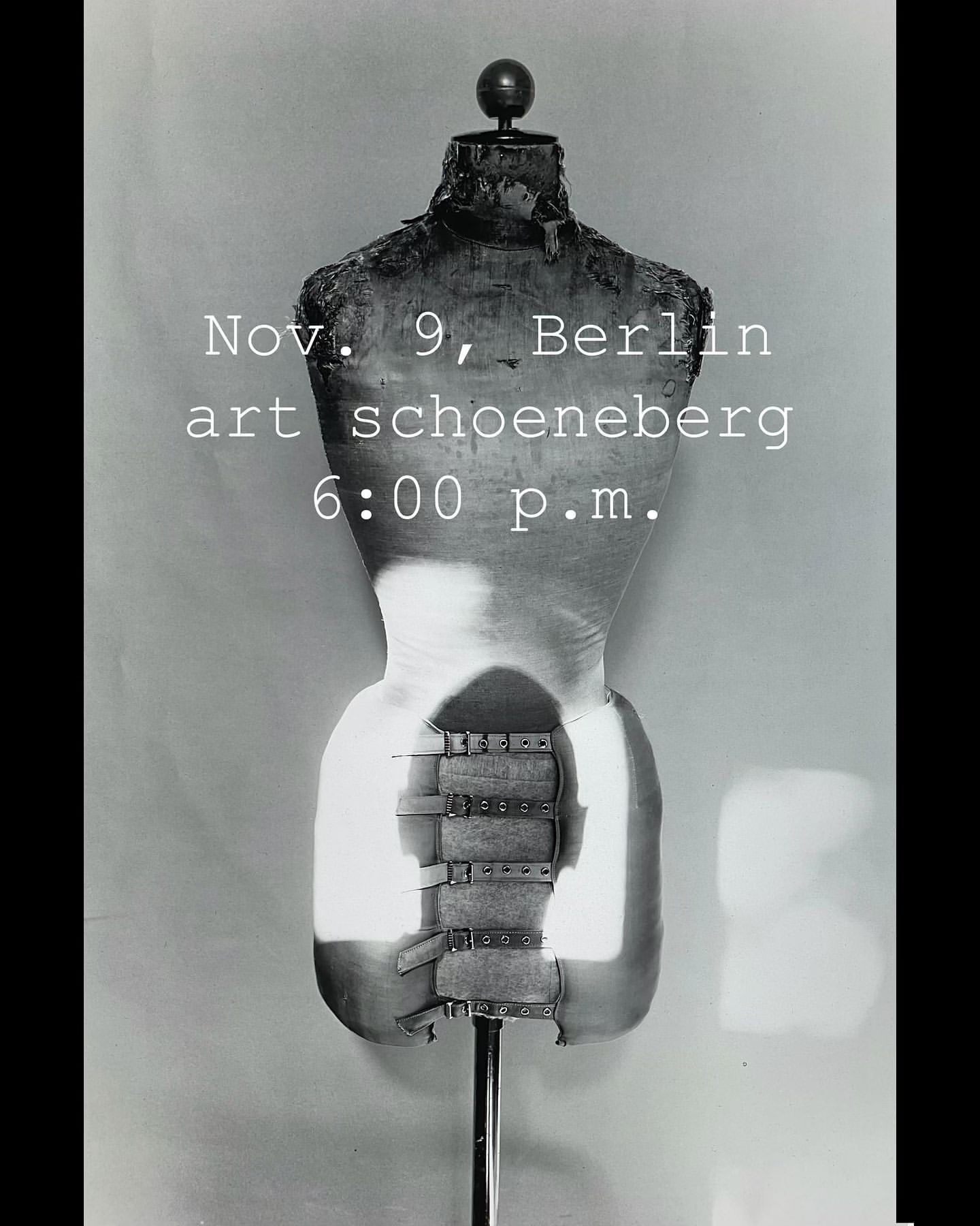 Black-and-white photograph of a vintage torso mannequin on a metal stand against a plain wall, with event advertisement text overlayed.