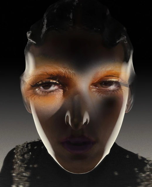 Close-up portrait of a woman with glossy skin and golden eyeshadow, set against a dark backdrop, highlighting her facial features.