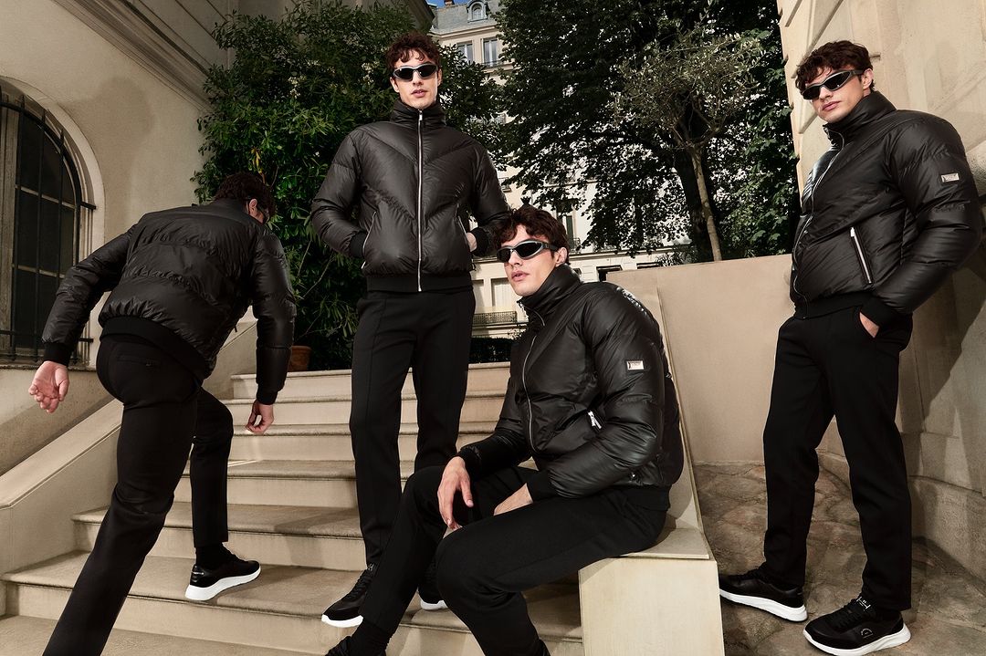 Multiple shots of a man in a black puffer jacket and sunglasses posing on stone outdoor steps.