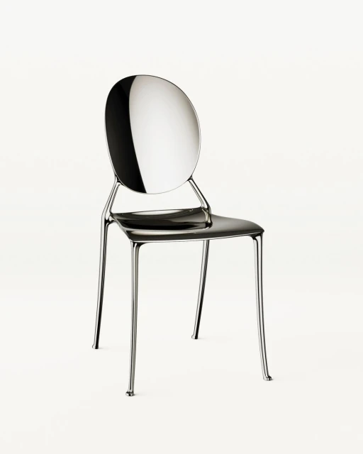 Modern transparent chair on a white background. Minimalist chair with a round back and silver chrome legs. Product photography. Interior design.