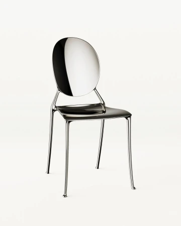 Modern transparent chair on a white background. Minimalist chair with a round back and silver chrome legs. Product photography. Interior design.