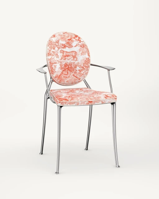 Armchair with chrome frame and red-and-white patterned upholstery on a white background, home decor and seating for interior design.