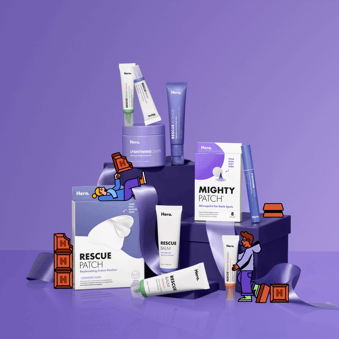 Hero Cosmetics skincare product assortment in a purple color scheme with stylized cartoon people and product packaging. Studio product shot.