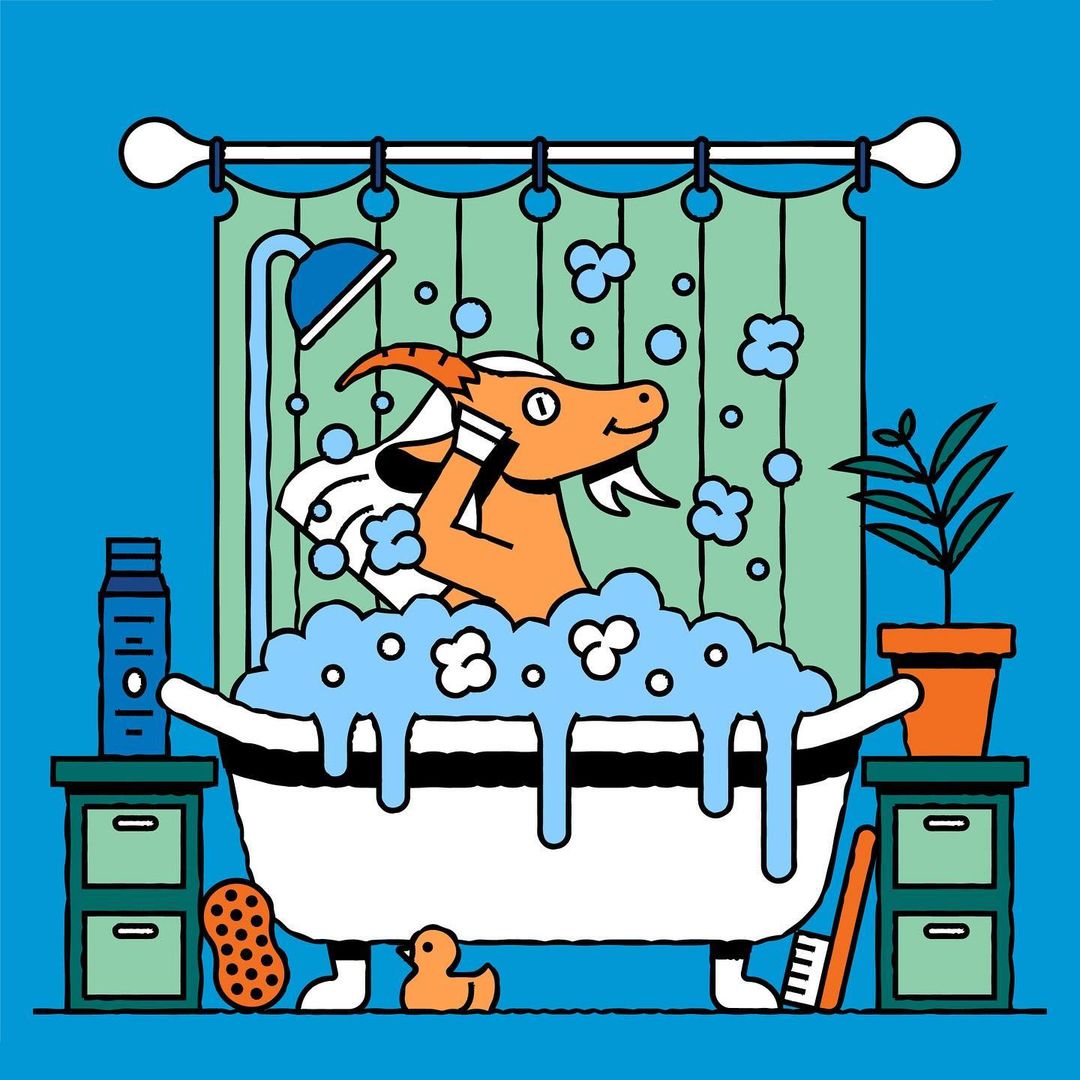 Cartoon goat takes a bath with bubbles, rubber duck, and plant, against a blue background and behind a green striped shower curtain.