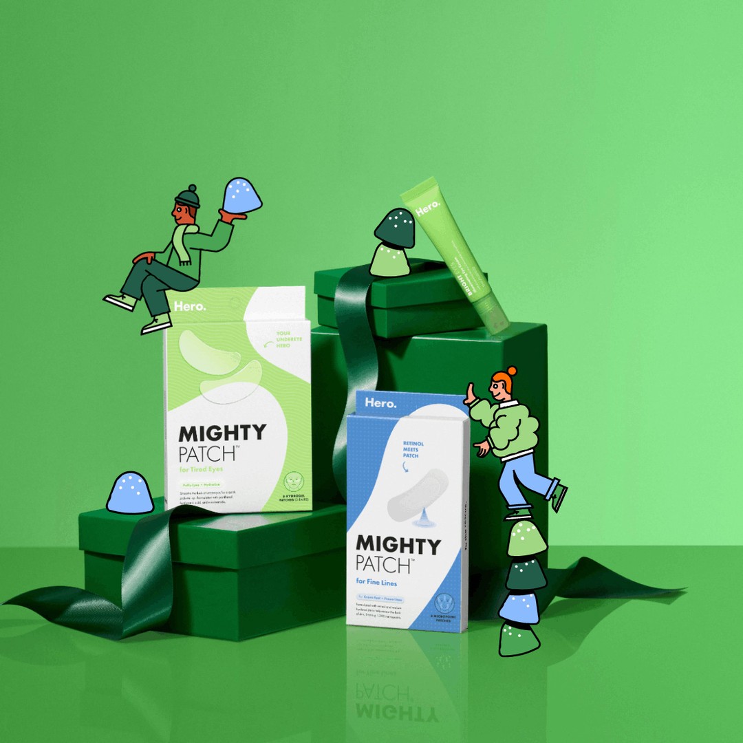 Hero Cosmetics Mighty Patch products displayed on green blocks with ribbon and cartoon-style illustrations of people.