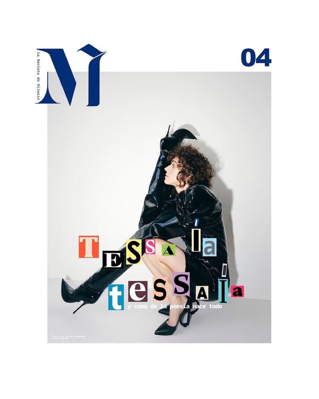 Editorial fashion cover with a woman in a shiny black dress and knee-high boots, crouching against a white backdrop with magazine text.