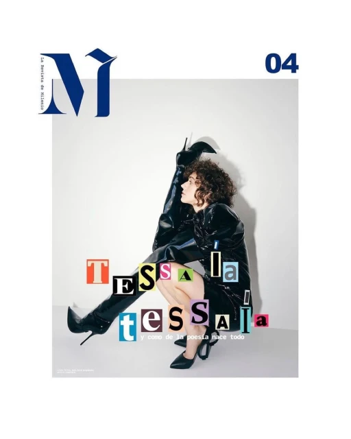 Editorial fashion cover with a woman in a shiny black dress and knee-high boots, crouching against a white backdrop with magazine text.