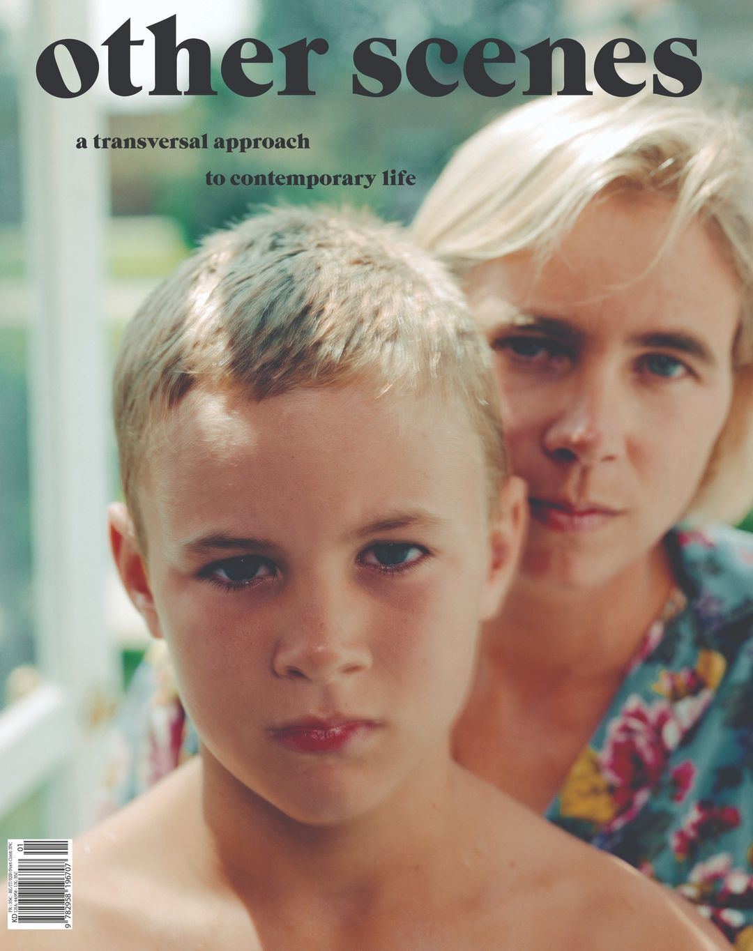 Magazine cover featuring a boy and woman, likely a mother-son pair, with the title 'other scenes' and floral shirt in an outdoor setting.