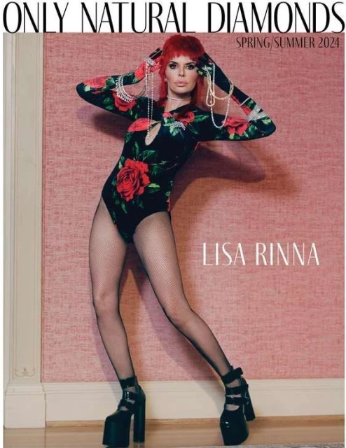 Lisa Rinna in a floral bodysuit, fishnet stockings, and platform heels poses against a pink wall, showcasing 'Only Natural Diamonds' ad.