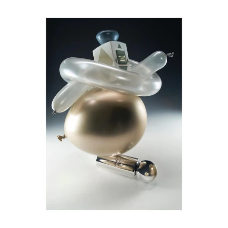 Still life with golden and silver balloons, and an abstract geometric form with a monitor, creating a surreal, unique composition.