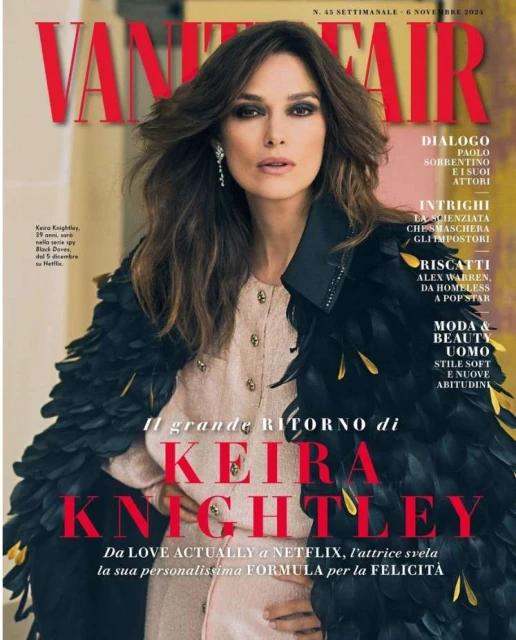 Vanity Fair cover featuring Keira Knightley in a feathered jacket, posing indoors against a neutral wall. The cover includes magazine text.