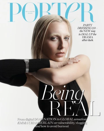 Emma Chamberlain cover portrait for Porter Magazine. She wears a black dress, and a silver wristwatch. The background is white.