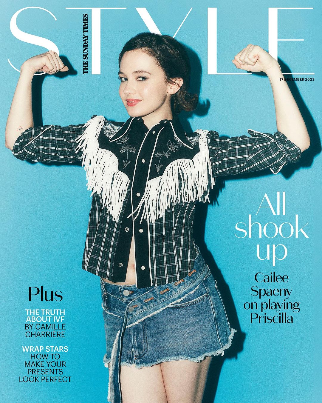 Cailee Spaeny, actress, poses on the cover of The Sunday Times STYLE magazine, wearing a western-style outfit against a light blue background.