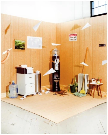 Office break room with flying paper airplanes, spilled coffee, and a water cooler; a humorous and chaotic office still life scene.
