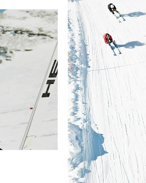Overhead shot of two skiers on a snowy slope, with ski tracks visible. A white board with black text is on the left side.