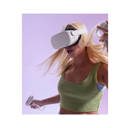 Young woman wearing a VR headset and holding controllers against a light purple background, creating an immersive gaming experience.