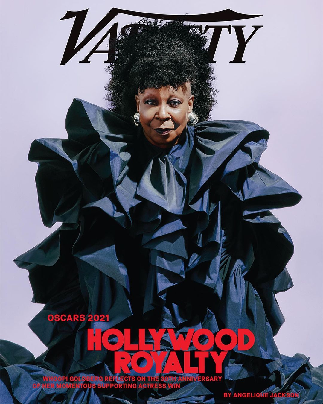 Magazine cover featuring Whoopi Goldberg in a navy ruffled dress against a lilac background, with the Variety logo at the top.