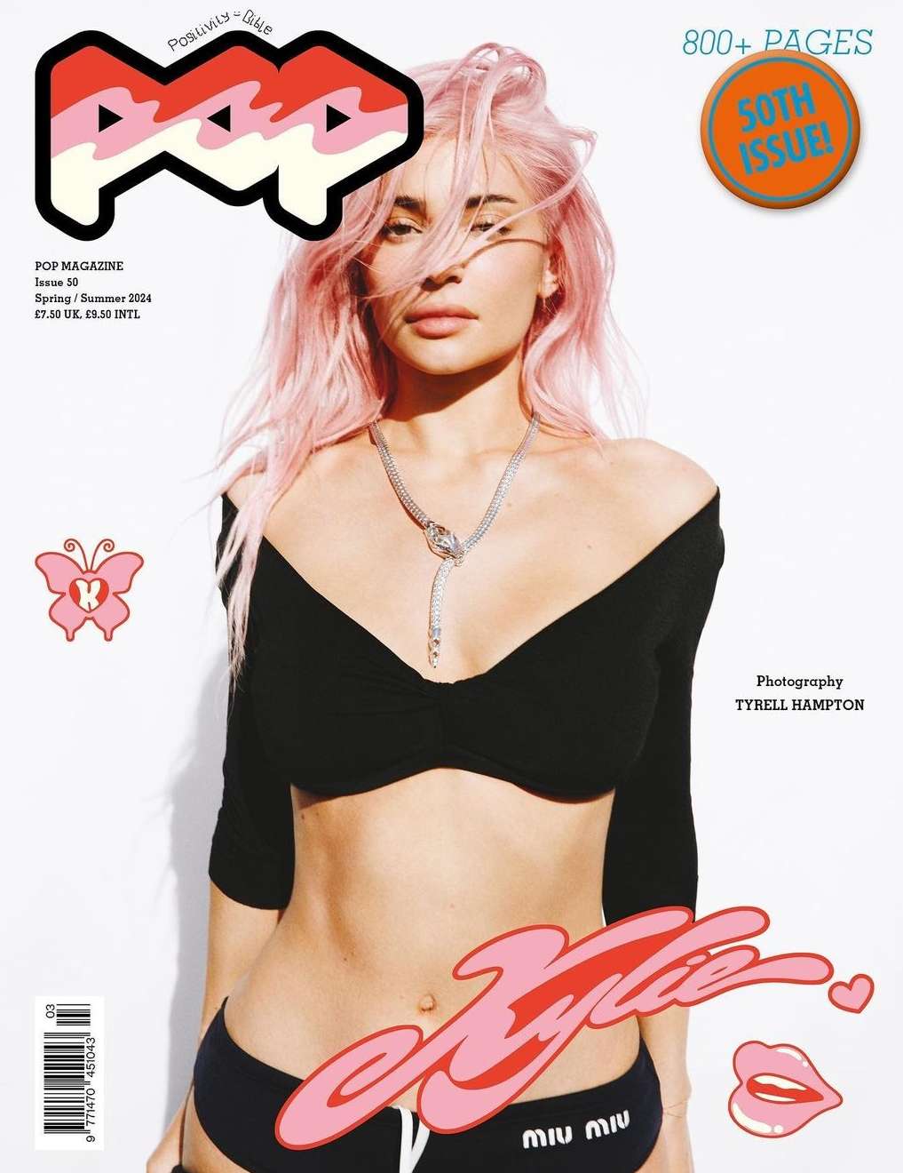 Pop Magazine cover featuring Kylie Jenner with pink hair, wearing a black top and briefs against a white background. Magazine issue.