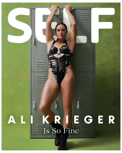 Athletic woman in a black bodysuit leans against grey lockers. Magazine cover. Ali Krieger is So Fine. Green and grey tones dominate.