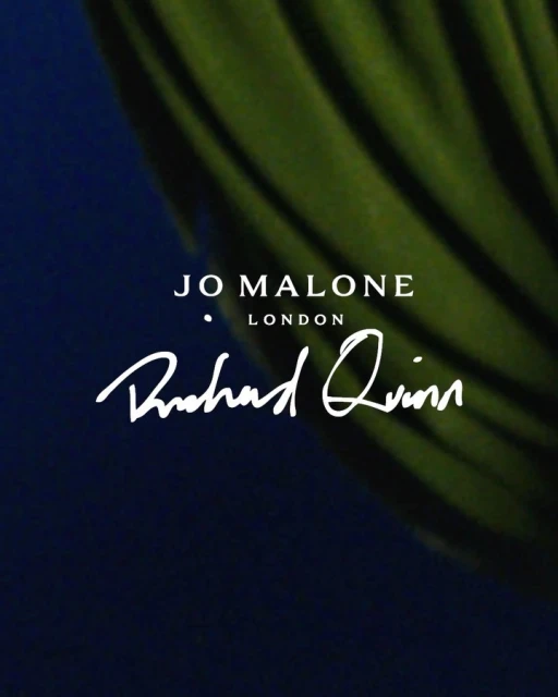 Jo Malone London and Richard Quinn logo displayed on a blue and green textured background. Fashion and beauty advertising campaign.