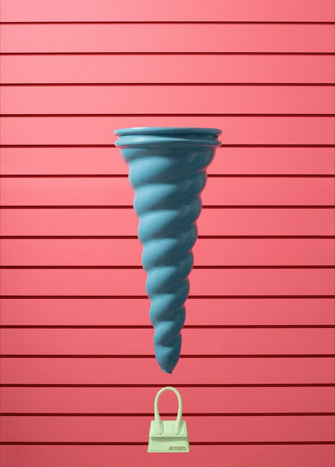 Conceptual still life with a blue vase and small, off-white purse against a backdrop of coral pink horizontal planks.
