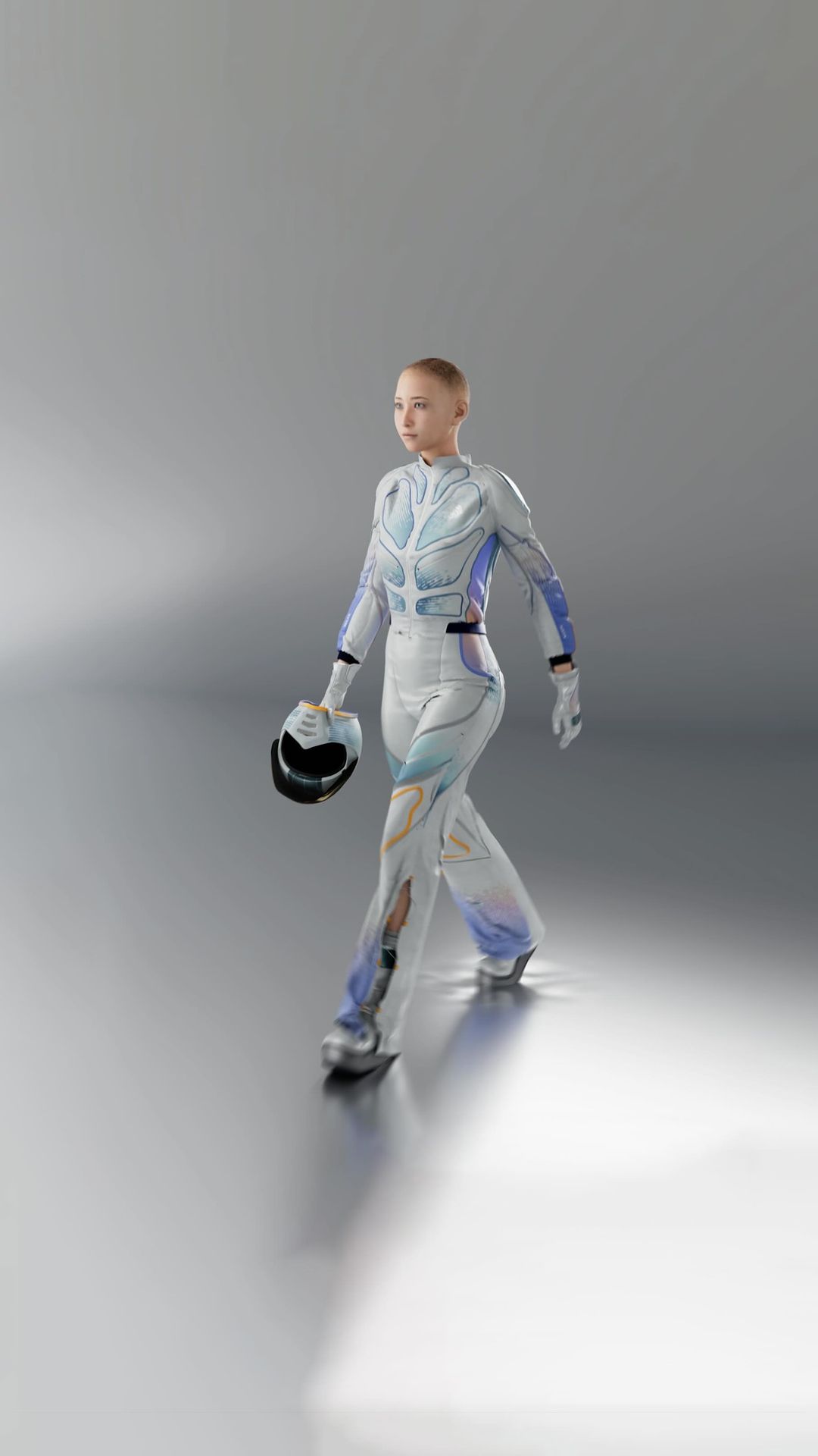 A woman wearing a white and blue racing suit walks in a light grey studio, holding a black helmet with a reflective visor.