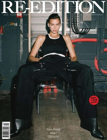 Irina Shayk wears Givenchy in a studio fashion shot for Re-Edition Magazine, showcasing a black tank top and baggy trousers with black heeled boots.