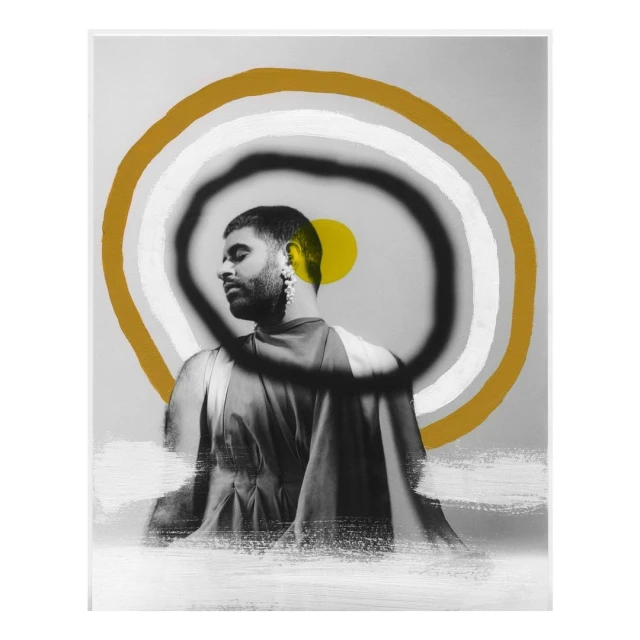 Portrait of a man with painted rings and brushstrokes in the background. Artistic, fashion, portrait photography. Contemporary art piece.