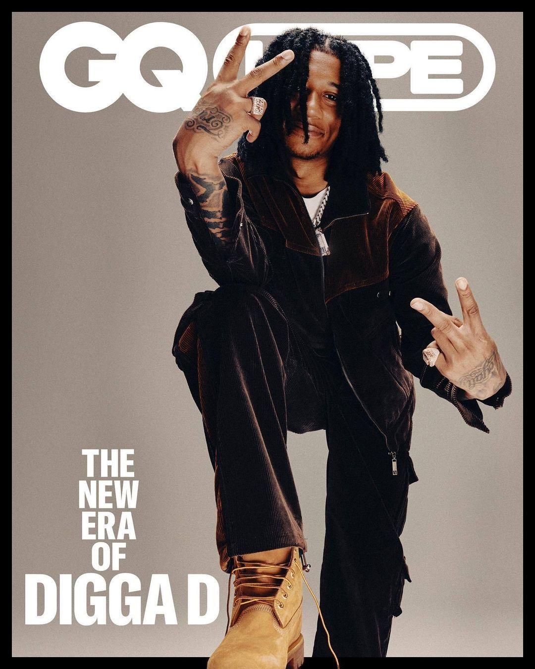Digga D poses in a magazine cover-style image, wearing a brown jacket, dark pants, and tan boots, with GQ logo, text in frame.