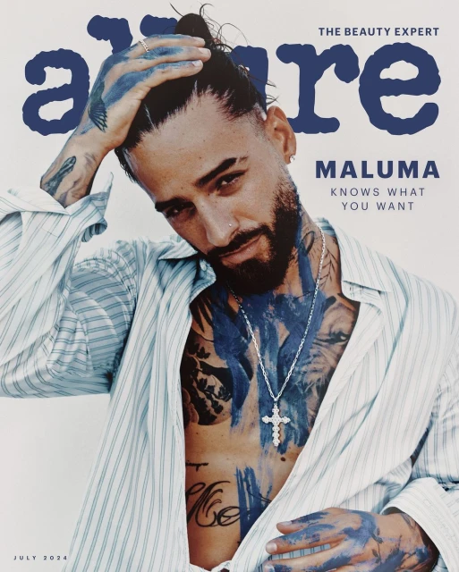 Allure magazine cover featuring Maluma with blue paint accents, striped shirt, and silver cross necklace against a cream backdrop.