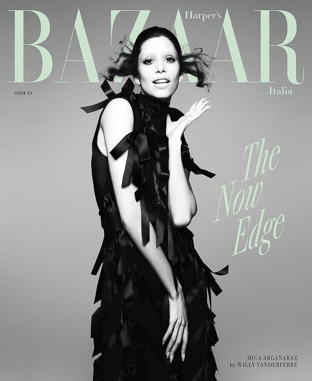 Harper's Bazaar Italia cover features a woman in a black ribbon dress against a gray background, with magazine text overlay.