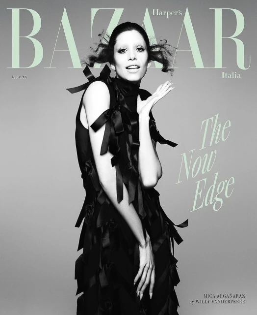 Harper's Bazaar Italia cover features a woman in a black ribbon dress against a gray background, with magazine text overlay.