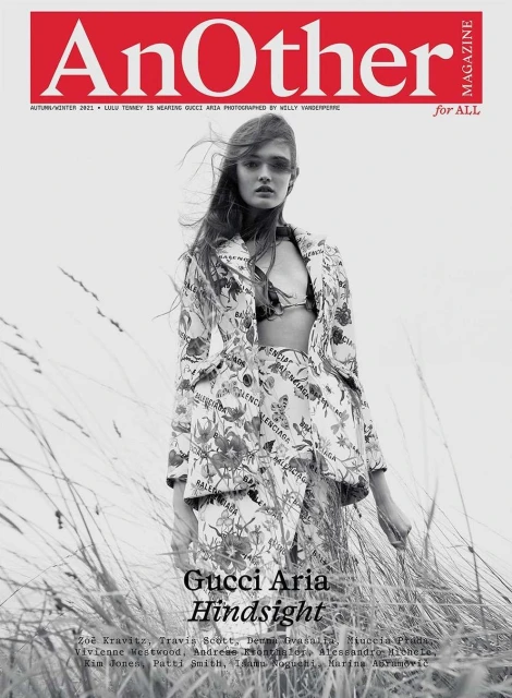 Fashion magazine cover featuring a woman in a floral Balenciaga suit, photographed outdoors with a red "AnOther" logo and black text.