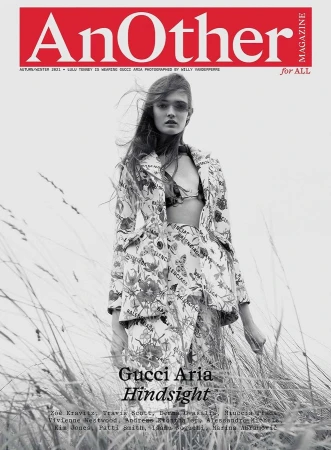 Fashion magazine cover featuring a woman in a floral Balenciaga suit, photographed outdoors with a red "AnOther" logo and black text.