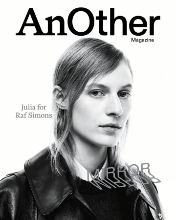 Fashion magazine cover featuring a woman with fair skin and light brown hair, wearing a black leather jacket, against a white background.