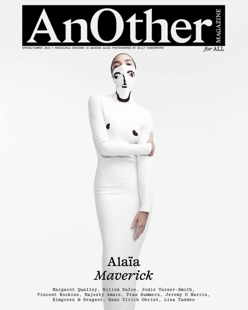 Magazine cover featuring a fashion model wearing a face covering and a white dress, against a light background, promoting Alaïa Maverick.