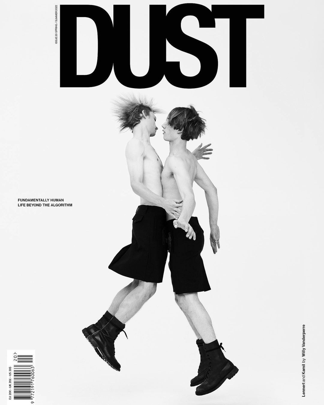 Dust Magazine cover with two shirtless young men in black shorts and boots jumping against a white background with large magazine title.