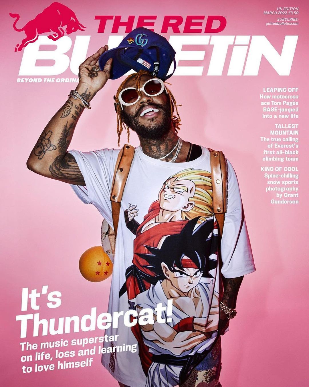 Magazine cover featuring Thundercat wearing round glasses and a baseball cap, with an anime T-shirt, and a Dragon Ball.