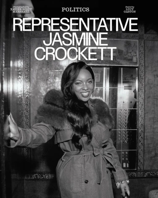 Portrait of Jasmine Crockett in trench coat with fur collar standing in front of elevator in black and white for magazine cover.