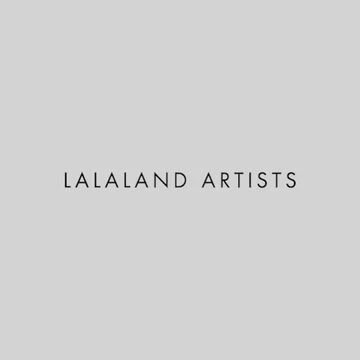 A text-based image featuring the words 'LALALAND ARTISTS' in simple, centered, black uppercase letters against a neutral gray background.