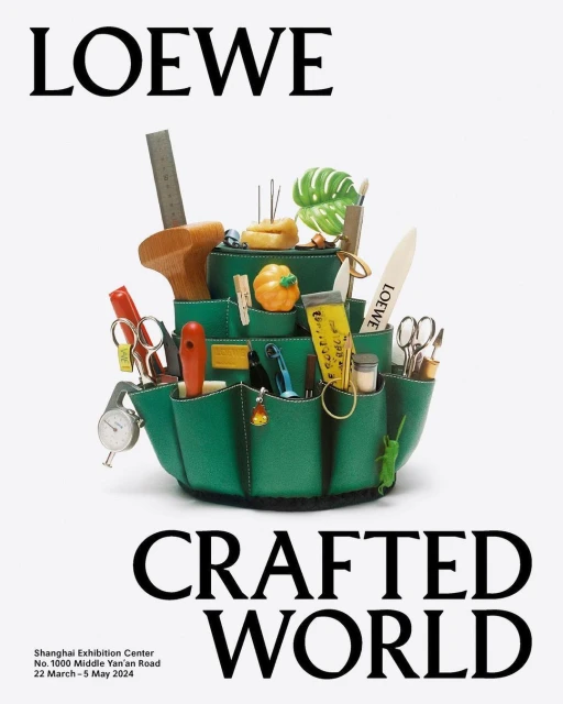 Still life studio photography of a green leather crafting organizer filled with tools and Loewe branded objects on a white background.