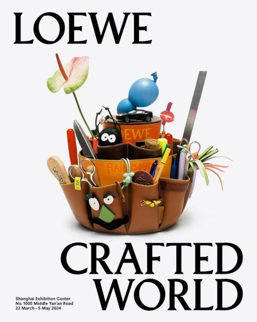 Loewe Crafted World ad with a leather container holding tools and toys, set against a plain background, promoting an exhibit.