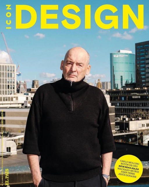 Magazine cover featuring an older man in a black sweater, posing with an unsmiling expression against an urban skyline backdrop.