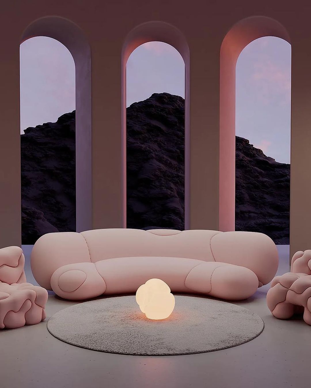 Interior rendering of a pink organic couch and armchairs on a rug, facing three arched windows revealing a mountain and dusk sky.
