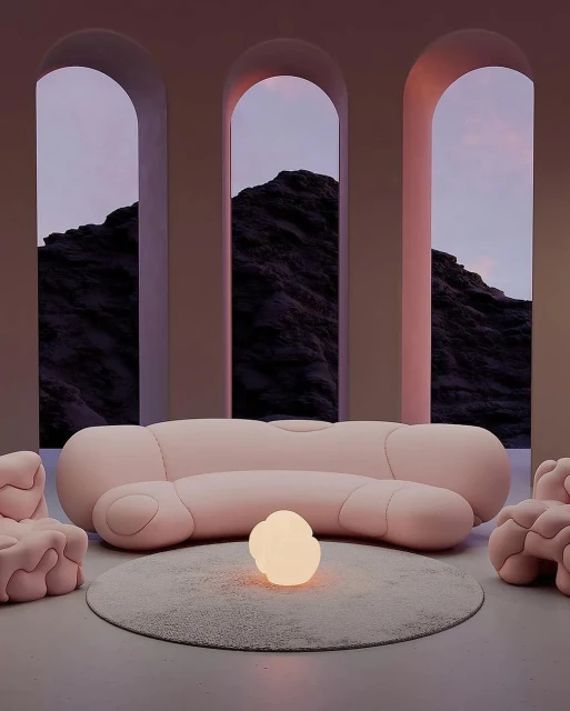 Interior rendering of a pink organic couch and armchairs on a rug, facing three arched windows revealing a mountain and dusk sky.
