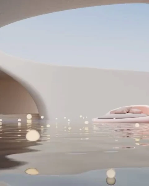 A pink, round outdoor bed sits on water, reflecting glowing orbs under an architectural overhang against a soft blue sky.