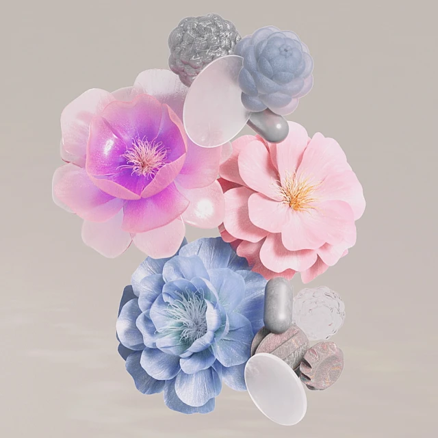 Floral arrangement featuring pink and blue flowers, along with decorative stones and silver metallic spheres, on a gradient background.