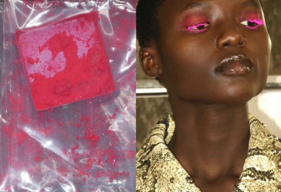 Close-up of a model's face with bright pink eyeliner, juxtaposed with a bag of red powder. Beauty and fashion concept.