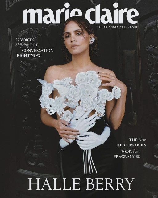 Marie Claire magazine cover featuring Halle Berry in white floral dress, photographed in a medium shot in front of a dark, carved door.