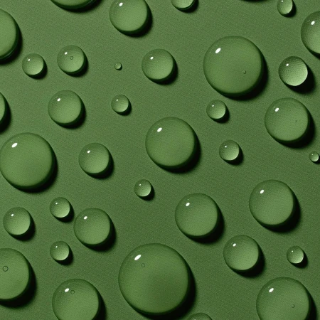 Macro photograph of water droplets of varying sizes scattered across a solid green surface with a soft, diffused light.